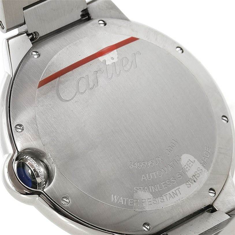 The image shows the back case of a Ballon Bleu de Cartier watch, displaying engravings and part of the bracelet.