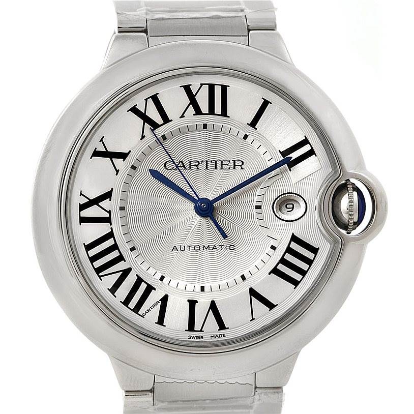 The image shows the face and part of the bracelet of a Cartier Ballon Bleu W69012Z4 Men
s Stainless Steel Silver Dial W69012Z4 Men
s Stainless Steel Silver Dial watch, with Roman numerals and a date window at 3 o
clock.