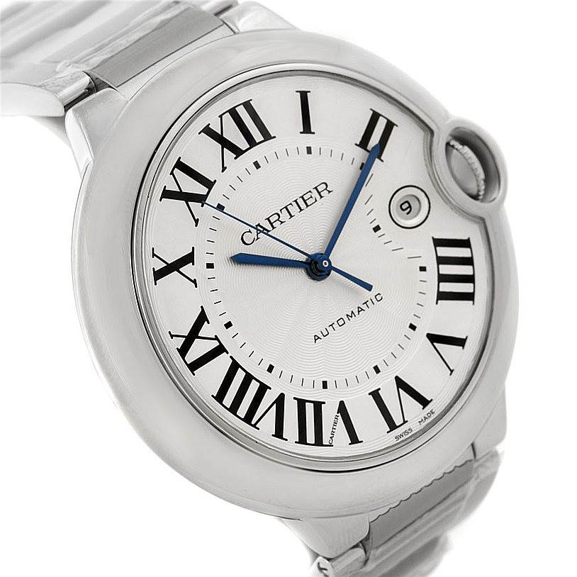 The image shows a close-up of the dial and part of the bracelet of the Ballon Bleu model by Cartier.
