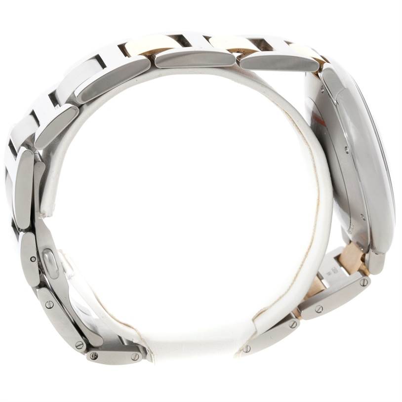 The image shows a side view of the Ballon Bleu model by Cartier, focusing on the bracelet and side of the case.