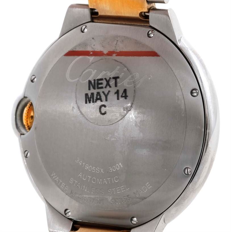 The image shows the back of a Cartier Ballon Bleu W69009Z3 Men
s Stainless Steel Silver Dial W69009Z3 Men
s Stainless Steel Silver Dial watch, highlighting the stainless steel case, screws, markings, and part of the strap.