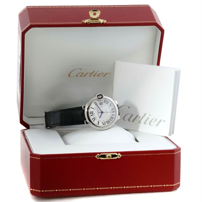 The image shows a Cartier Ballon Bleu W69017Z4 Women
s Stainless Steel Silver Dial W69017Z4 Women
s Stainless Steel Silver Dial watch in its box with a booklet, viewed from a front angle.