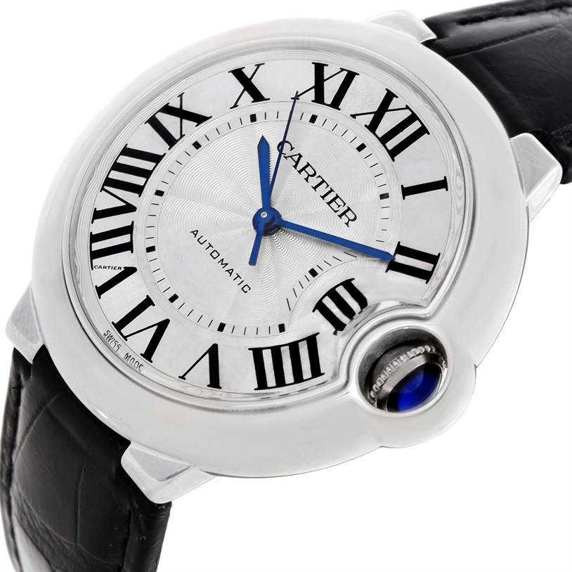 This image shows a close-up, angled view of the Cartier Ballon Bleu W69017Z4 Women
s Stainless Steel Silver Dial W69017Z4 Women
s Stainless Steel Silver Dial watch face and part of the leather strap.