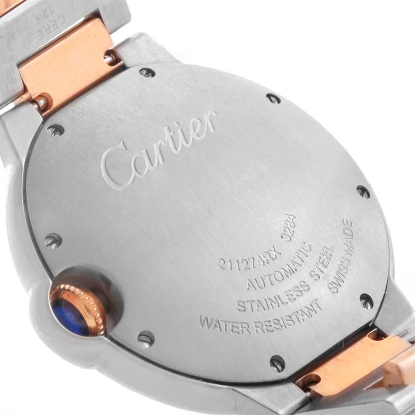 This image shows the back case and part of the bracelet of the Cartier Ballon Bleu W6920070 Women's Steel and Gold (two tone) Mother of Pearl Dial W6920070 Women's Steel and Gold (two tone) Mother of Pearl Dial watch, highlighting the engraved details.