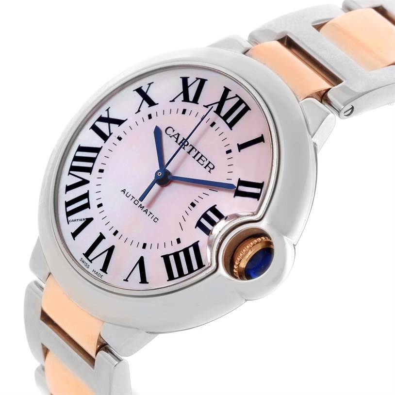 This image shows a close-up angled view of the dial and bracelet of the Ballon Bleu by Cartier.