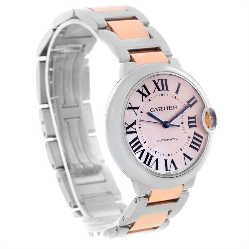 The image shows a Ballon Bleu de Cartier watch at a three-quarter angle, highlighting its face, bezel, and bracelet.