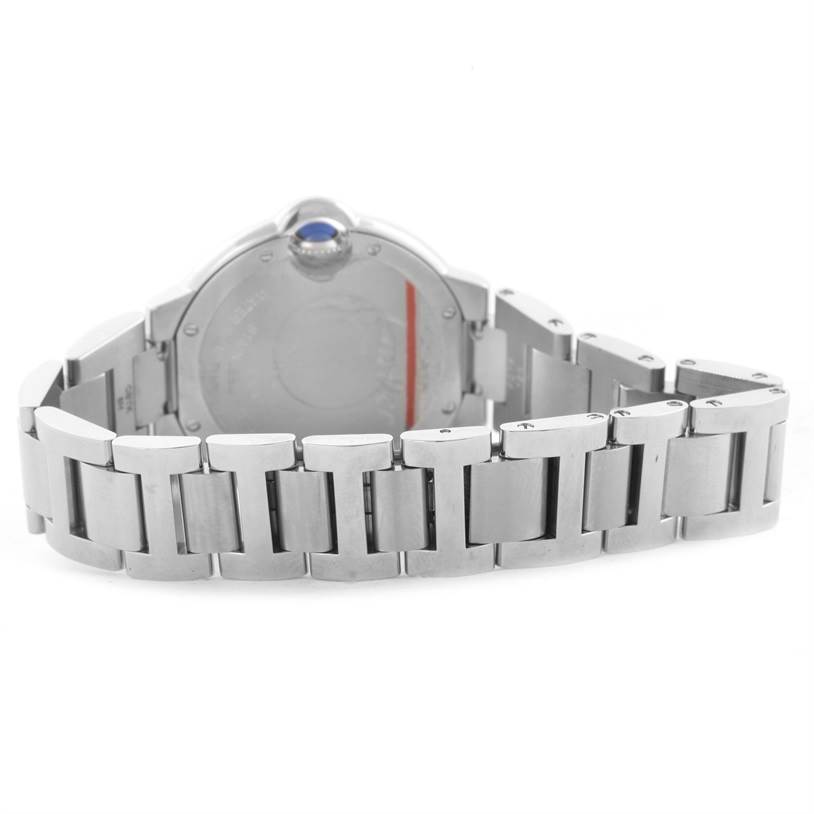 This image shows the back and bracelet of a Ballon Bleu by Cartier, focusing on the stainless steel links and case back.