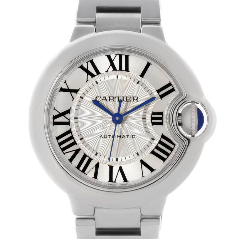 The image shows a front view of a Ballon Bleu model by Cartier, highlighting the watch face, Roman numerals, and blue hands.