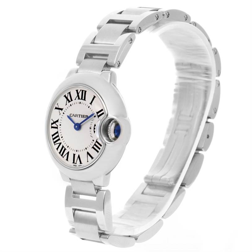 The Cartier Ballon Bleu W69010Z4 Women
s Stainless Steel Silver Dial W69010Z4 Women
s Stainless Steel Silver Dial watch is shown from a three-quarter angle, highlighting the bracelet, face, and crown with a blue gemstone.