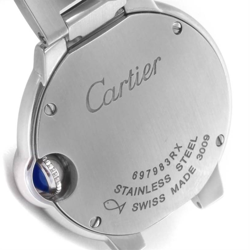 The image shows the back view of a Ballon Bleu model by Cartier, highlighting the stainless steel case and inscriptions.