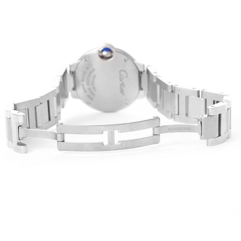 The image shows the back of a Cartier Ballon Bleu W69010Z4 Women
s Stainless Steel Silver Dial W69010Z4 Women
s Stainless Steel Silver Dial watch, highlighting the open clasp and stainless steel bracelet.