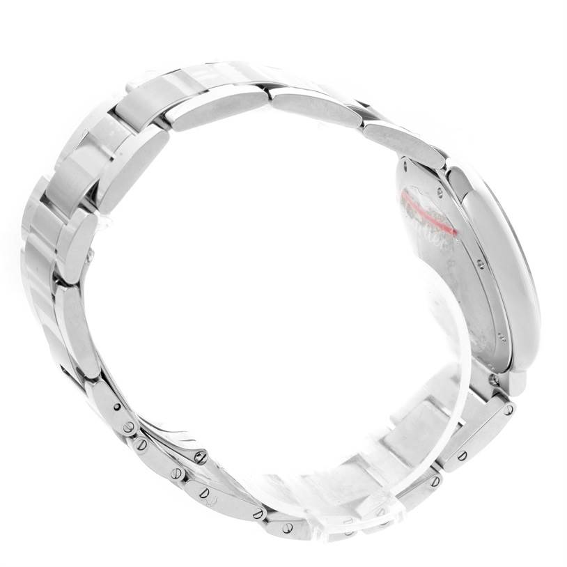 The image shows a Cartier Ballon Bleu W6920046 Women
s Stainless Steel Silver Dial W6920046 Women
s Stainless Steel Silver Dial watch from the side, highlighting its metal bracelet and the side of its case.