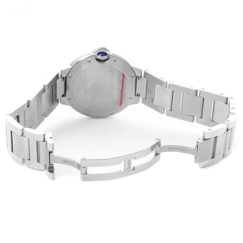 The image shows the back view of the Cartier Ballon Bleu W6920046 Women
s Stainless Steel Silver Dial W6920046 Women
s Stainless Steel Silver Dial watch, highlighting its open stainless steel bracelet and clasp.