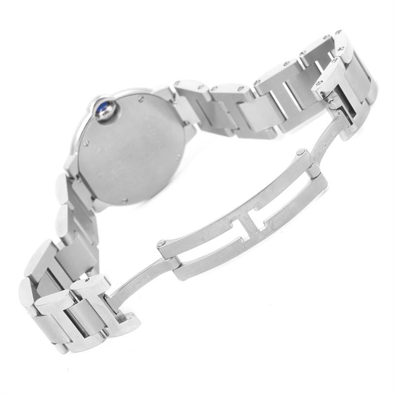 The image shows the backside and clasp of the Cartier Ballon Bleu W69010Z4 Women
s Stainless Steel Silver Dial W69010Z4 Women
s Stainless Steel Silver Dial watch, highlighting the metal bracelet and deployment clasp mechanism.