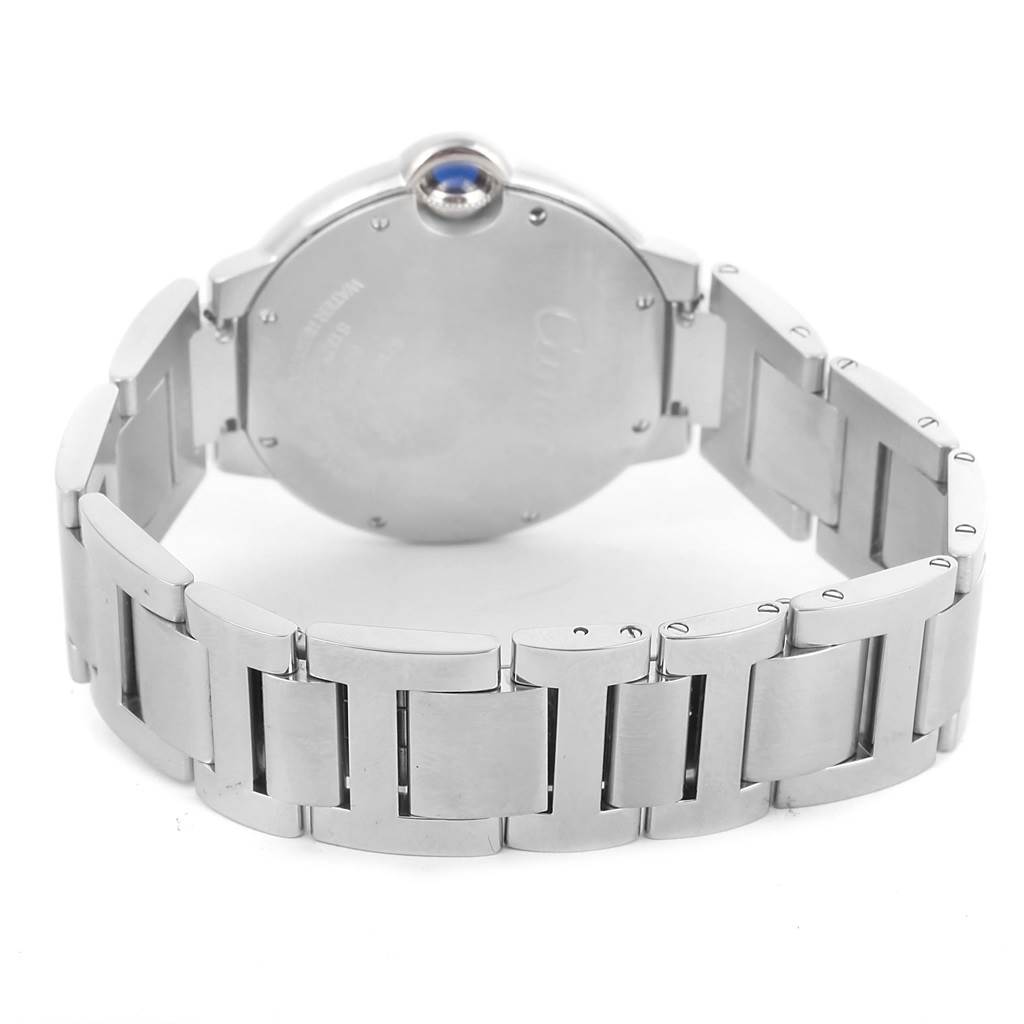 The image shows the back and bracelet of a Ballon Bleu by Cartier, highlighting the case back and metal strap.