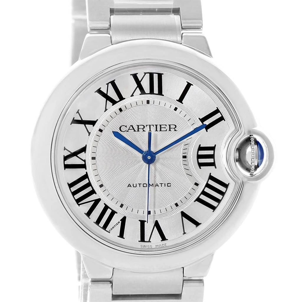 The image shows a front view of the Cartier Ballon Bleu W6920046 Women
s Stainless Steel Silver Dial W6920046 Women
s Stainless Steel Silver Dial watch, displaying the dial, roman numerals, and part of the bracelet.