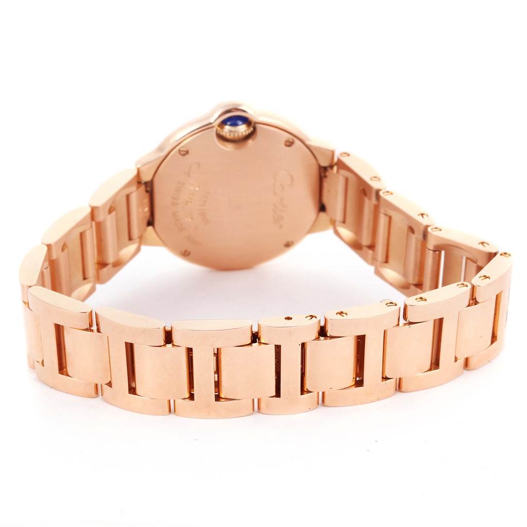 The image shows the back view of a Cartier Ballon Bleu W69002Z2 Women
s Rose Gold Silver Dial W69002Z2 Women
s Rose Gold Silver Dial watch, highlighting the bracelet and case back.