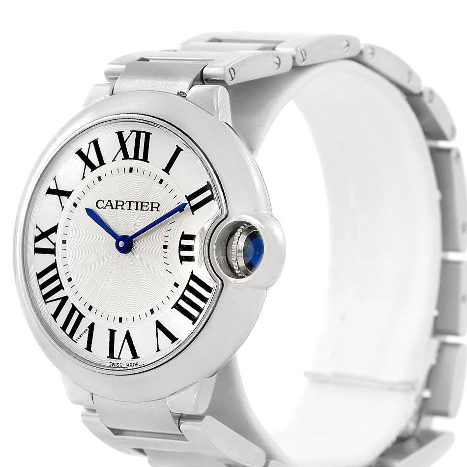 The image shows a side view of the Cartier Ballon Bleu W69011Z4 Women
s Stainless Steel Silver Dial W69011Z4 Women
s Stainless Steel Silver Dial watch, displaying its dial, bracelet, and signature crown.