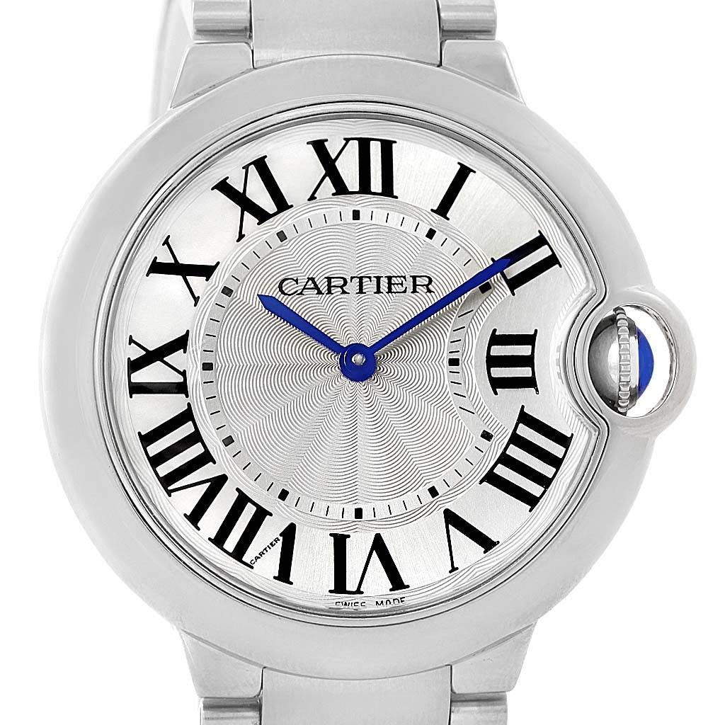 This image shows the front face of the Ballon Bleu model by Cartier, highlighting the dial, Roman numerals, and crown.