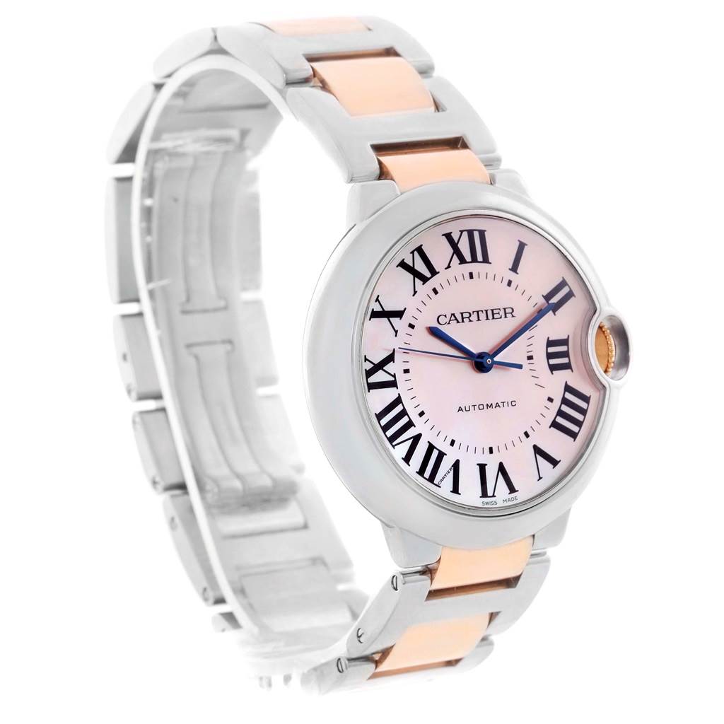 The image shows a front angle of the Cartier Ballon Bleu W6920070 Women's Steel and Gold (two tone) Mother of Pearl Dial W6920070 Women's Steel and Gold (two tone) Mother of Pearl Dial watch, highlighting its face and two-tone metal band.