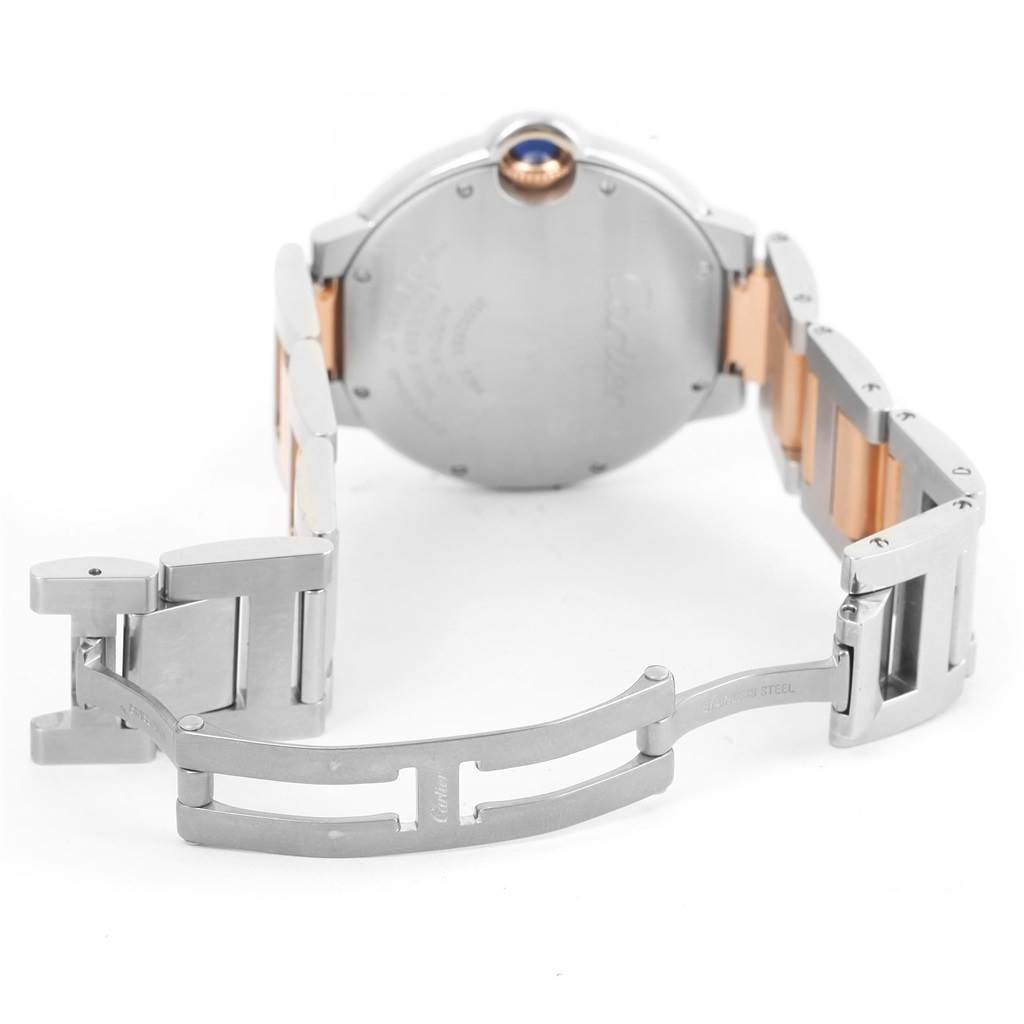 The image shows the back and bracelet of a Ballon Bleu model by Cartier, highlighting the clasp and case back.