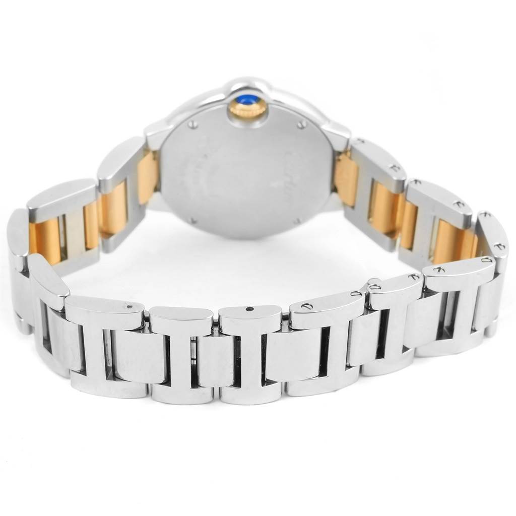 The image shows the back and strap of a Ballon Bleu model watch by Cartier, viewed from the rear.