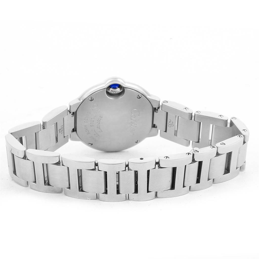 The image shows the back view of a Cartier Ballon Bleu W69010Z4 Women
s Stainless Steel Silver Dial W69010Z4 Women
s Stainless Steel Silver Dial watch, focusing on its case back and metal bracelet.