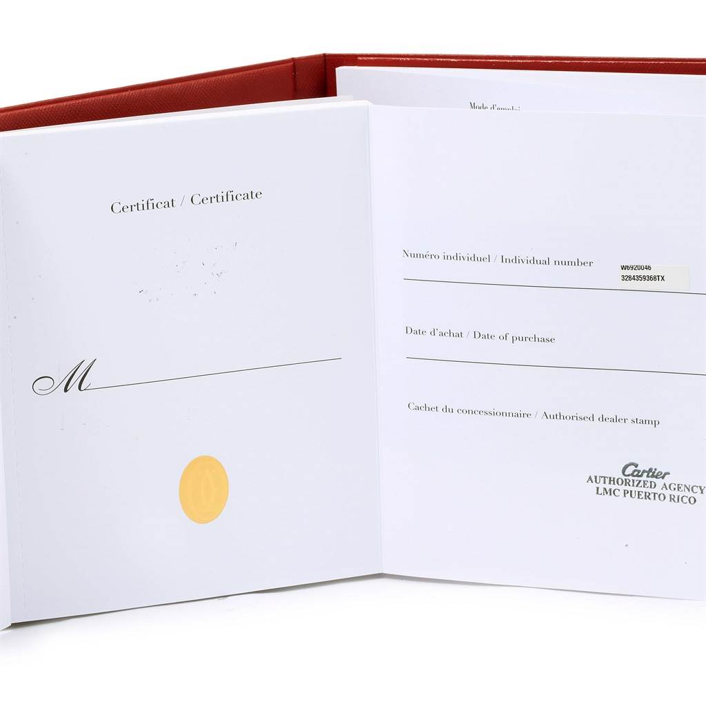 The image shows an open certificate booklet for a Cartier Ballon Bleu W6920046 Women
s Stainless Steel Silver Dial W6920046 Women
s Stainless Steel Silver Dial model watch.