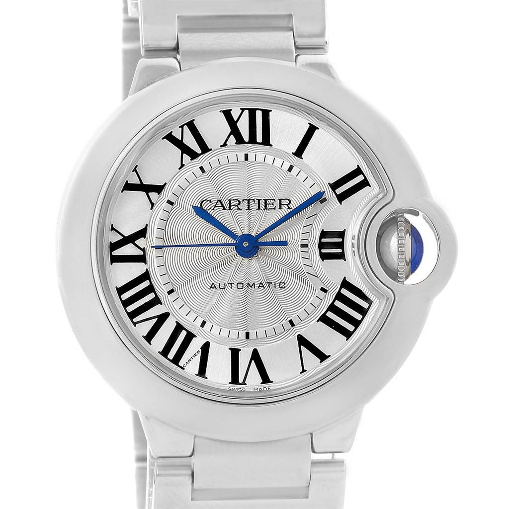 The image shows a front view of a Cartier Ballon Bleu W6920046 Women
s Stainless Steel Silver Dial W6920046 Women
s Stainless Steel Silver Dial watch, featuring a silver dial with Roman numerals and blue hands.