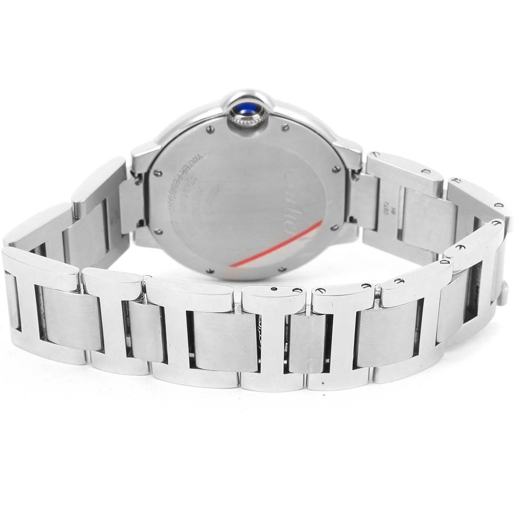 The image shows the back of a Cartier Ballon Bleu W6920046 Women
s Stainless Steel Silver Dial W6920046 Women
s Stainless Steel Silver Dial watch, focusing on the case back and metal bracelet.