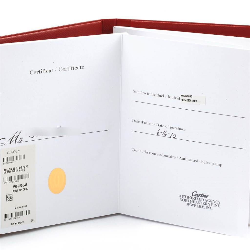 This image shows the opened warranty certificate booklet for the Cartier Ballon Bleu W6920046 Women
s Stainless Steel Silver Dial W6920046 Women
s Stainless Steel Silver Dial watch.