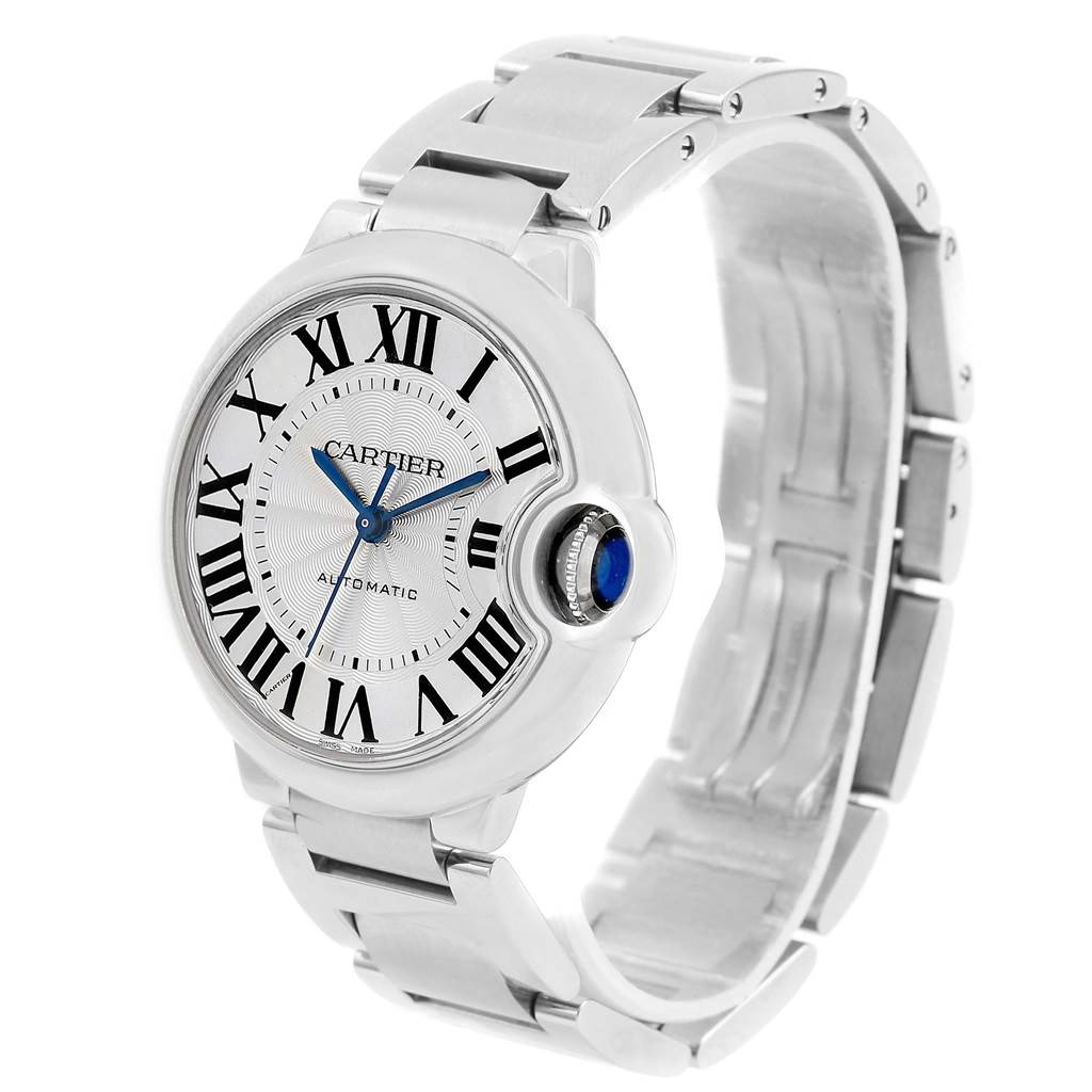 The image shows a side-angle view of the Ballon Bleu model by Cartier, highlighting the watch face, bezel, crown, and metal bracelet.