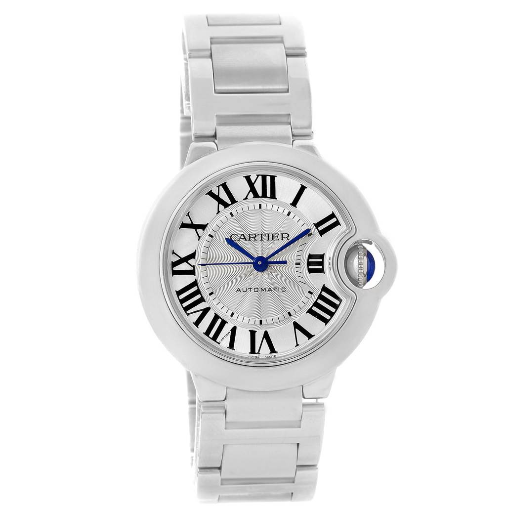 The image shows a front view of the Cartier Ballon Bleu W6920046 Women
s Stainless Steel Silver Dial W6920046 Women
s Stainless Steel Silver Dial watch, highlighting its face, roman numeral markers, and metal bracelet.
