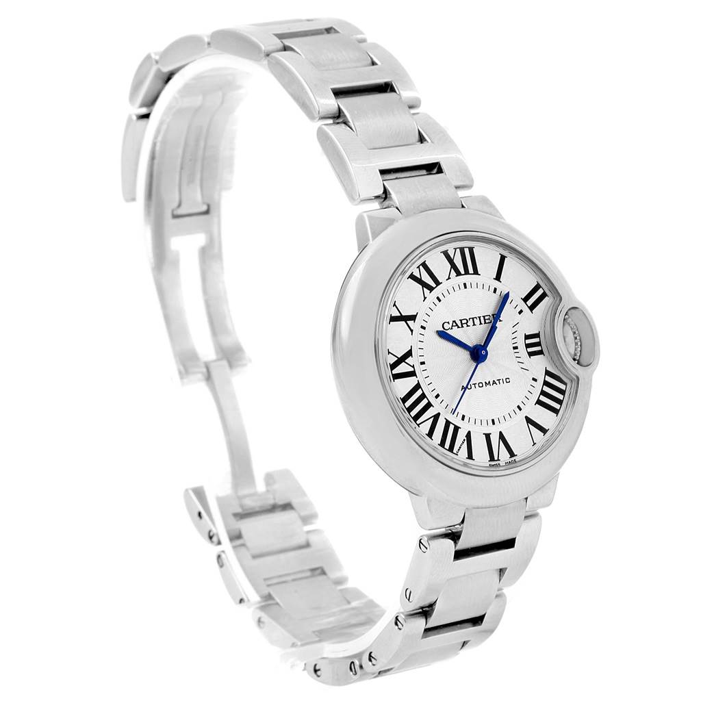 The image shows a stainless steel Cartier Ballon Bleu W6920071 Women
s Stainless Steel Silver Dial W6920071 Women
s Stainless Steel Silver Dial watch from an angled perspective, highlighting the face, bracelet, and crown.