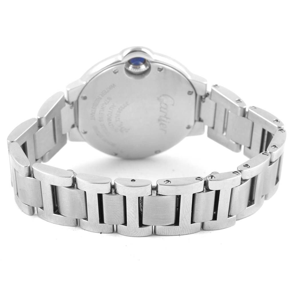 This image shows the back case and metal bracelet of the Cartier Ballon Bleu W6920071 Women
s Stainless Steel Silver Dial W6920071 Women
s Stainless Steel Silver Dial watch at a slight angle.