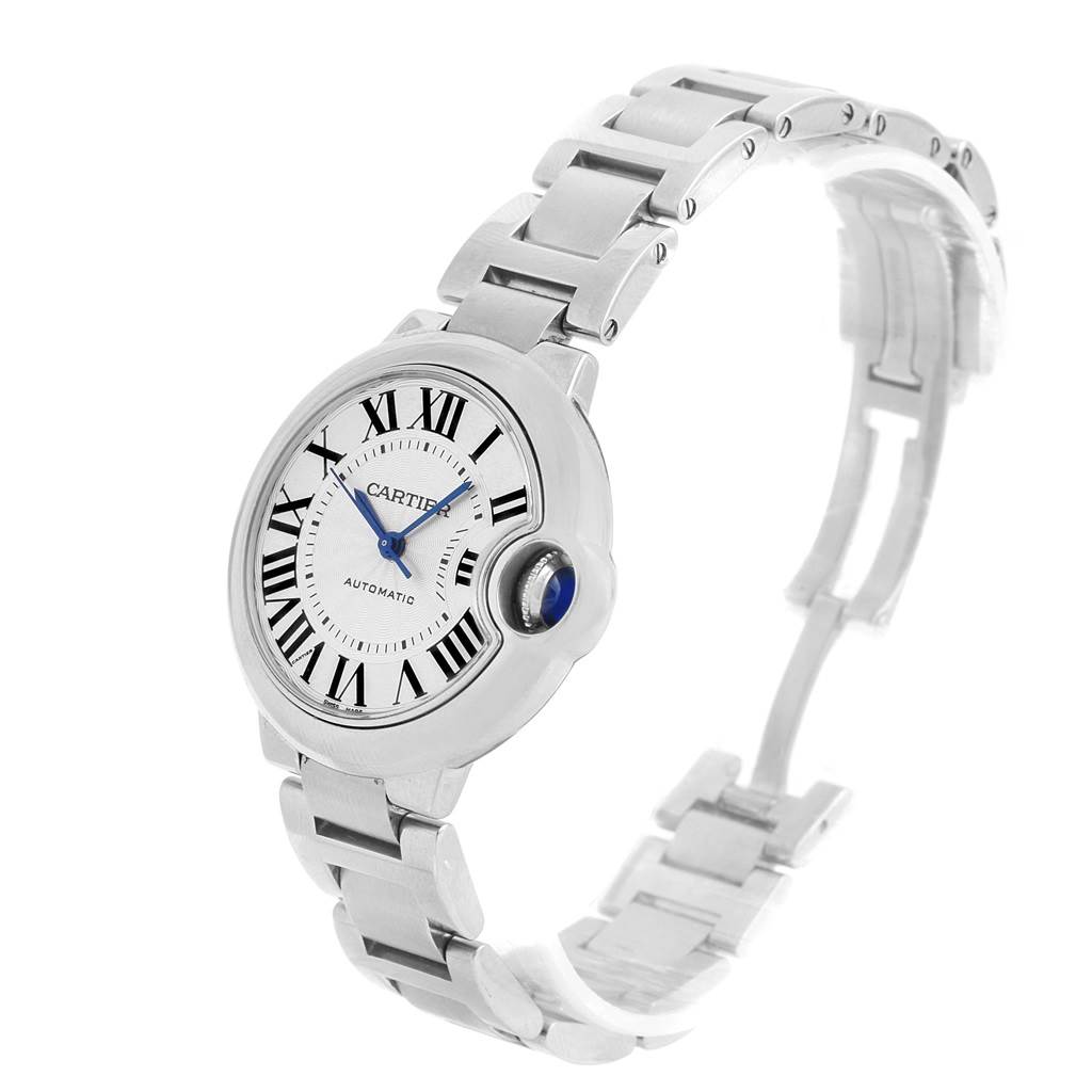The image shows a side angle of the Cartier Ballon Bleu W6920071 Women
s Stainless Steel Silver Dial W6920071 Women
s Stainless Steel Silver Dial watch, highlighting its face, bezel, crown, and metal bracelet.