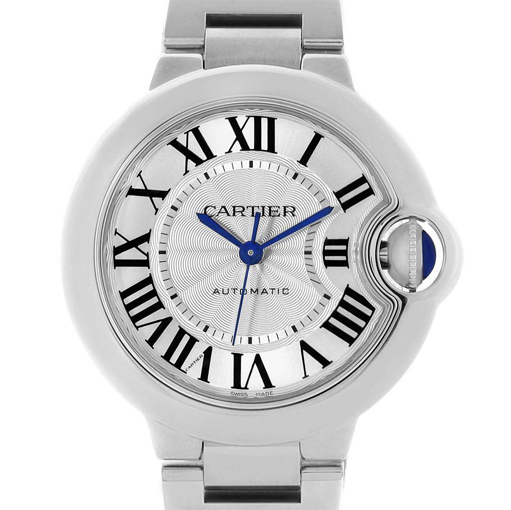 The image shows a front view of the Cartier Ballon Bleu W6920071 Women
s Stainless Steel Silver Dial W6920071 Women
s Stainless Steel Silver Dial watch, highlighting its dial, Roman numerals, and blue sapphire crown.
