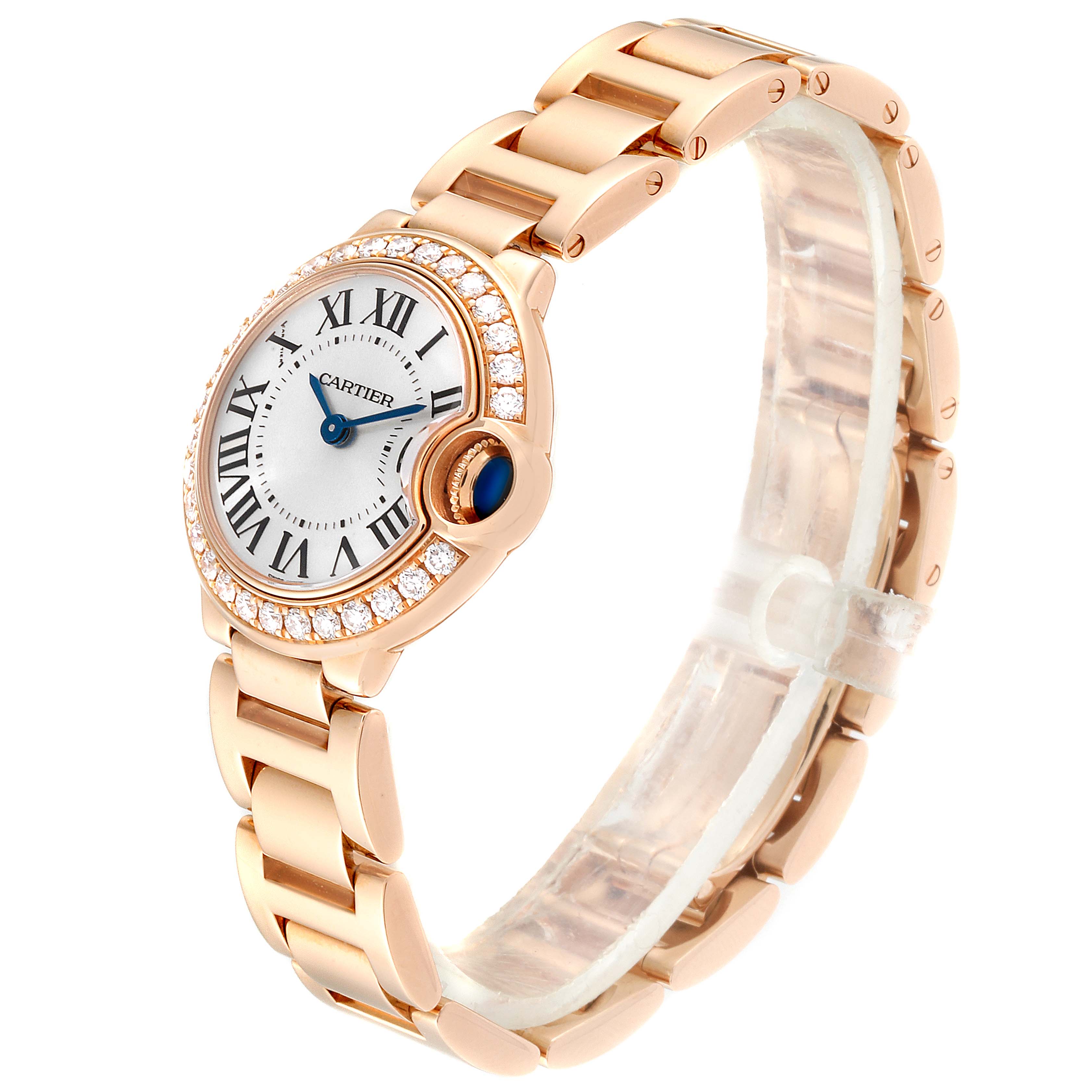 This image shows a side-angle view of a Cartier Ballon Bleu WE9002Z3 Women's Rose Gold Silver Dial WE9002Z3 Women's Rose Gold Silver Dial watch, highlighting the dial, diamond bezel, and link bracelet.