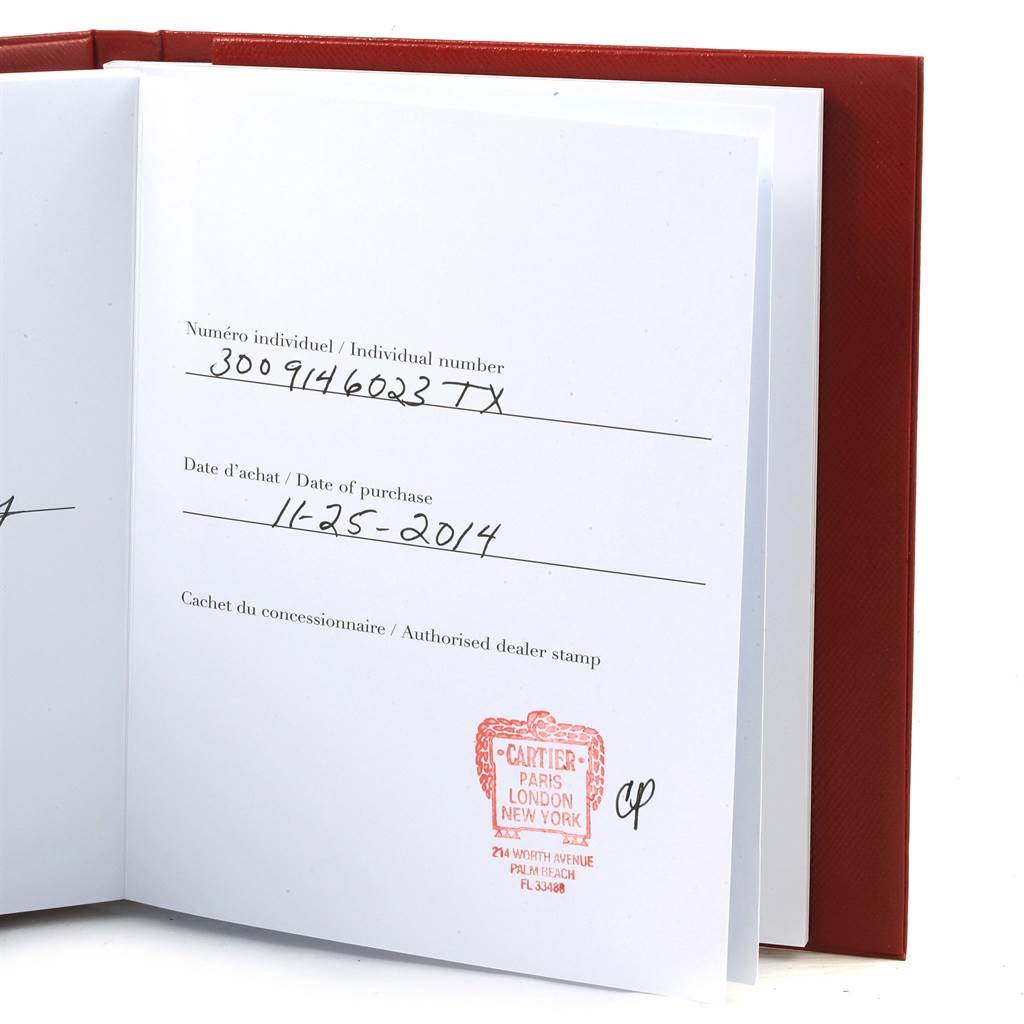 This image shows the inside pages of a certificate booklet for a Ballon Bleu model by Cartier, listing the individual number, purchase date, and dealer stamp.