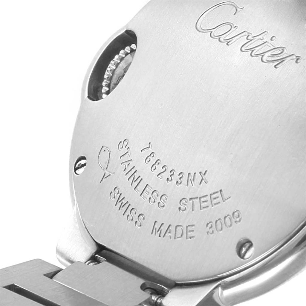 The image shows the back case and part of the bracelet of a Cartier Ballon Bleu W69010Z4 Women's Stainless Steel Silver Dial W69010Z4 Women's Stainless Steel Silver Dial watch, displaying its engravings and serial number.