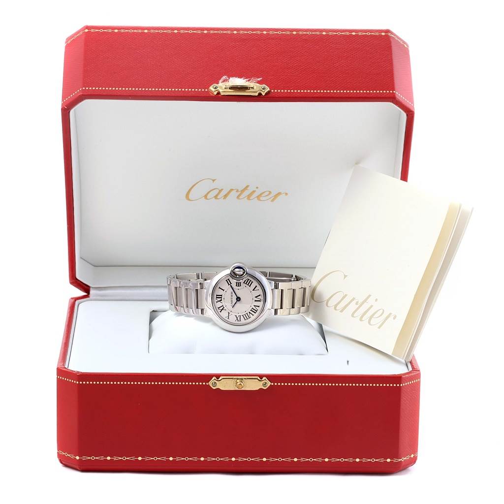 The Cartier Ballon Bleu W69010Z4 Women's Stainless Steel Silver Dial W69010Z4 Women's Stainless Steel Silver Dial watch is displayed front-facing inside a red Cartier box, with the booklet beside it.