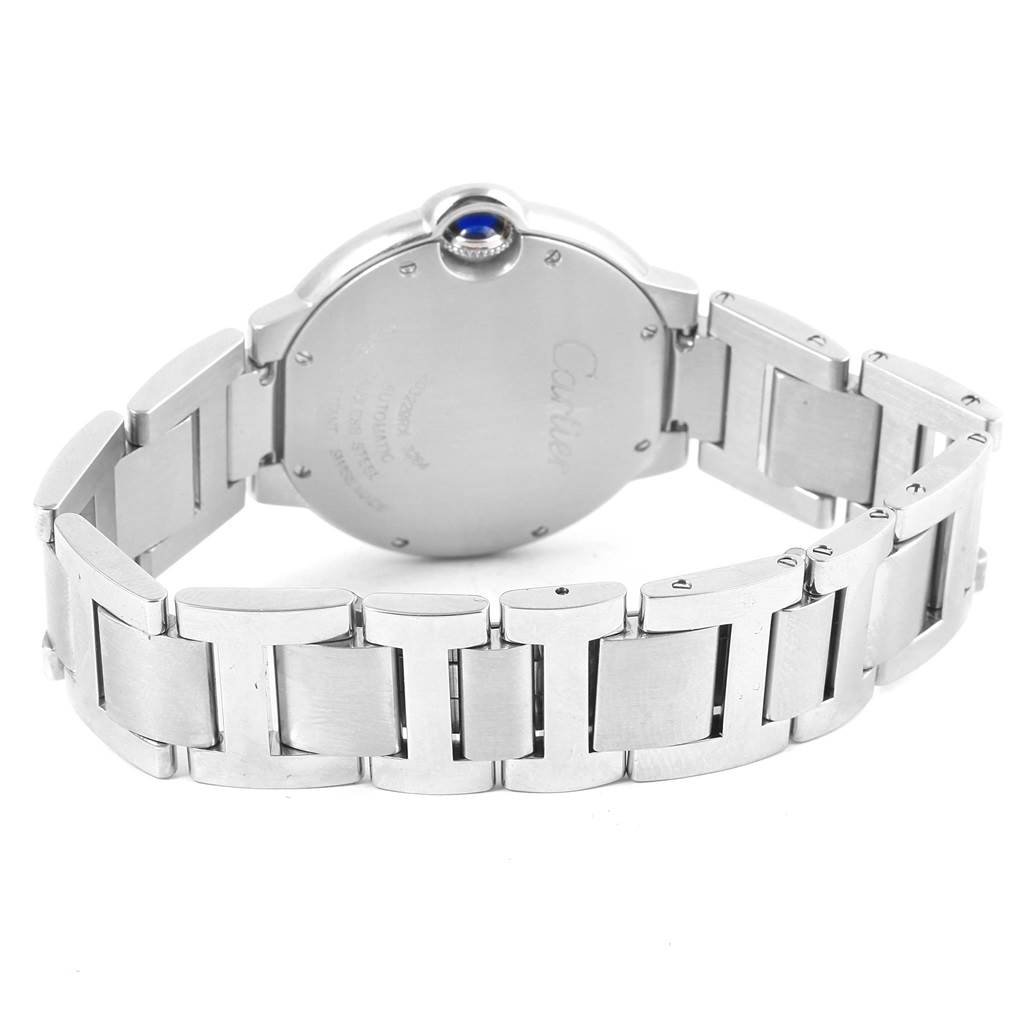 The image shows the back case and metal bracelet of a Cartier Ballon Bleu W6920046 Women's Stainless Steel Silver Dial W6920046 Women's Stainless Steel Silver Dial watch, with a focus on the bracelet and crown.