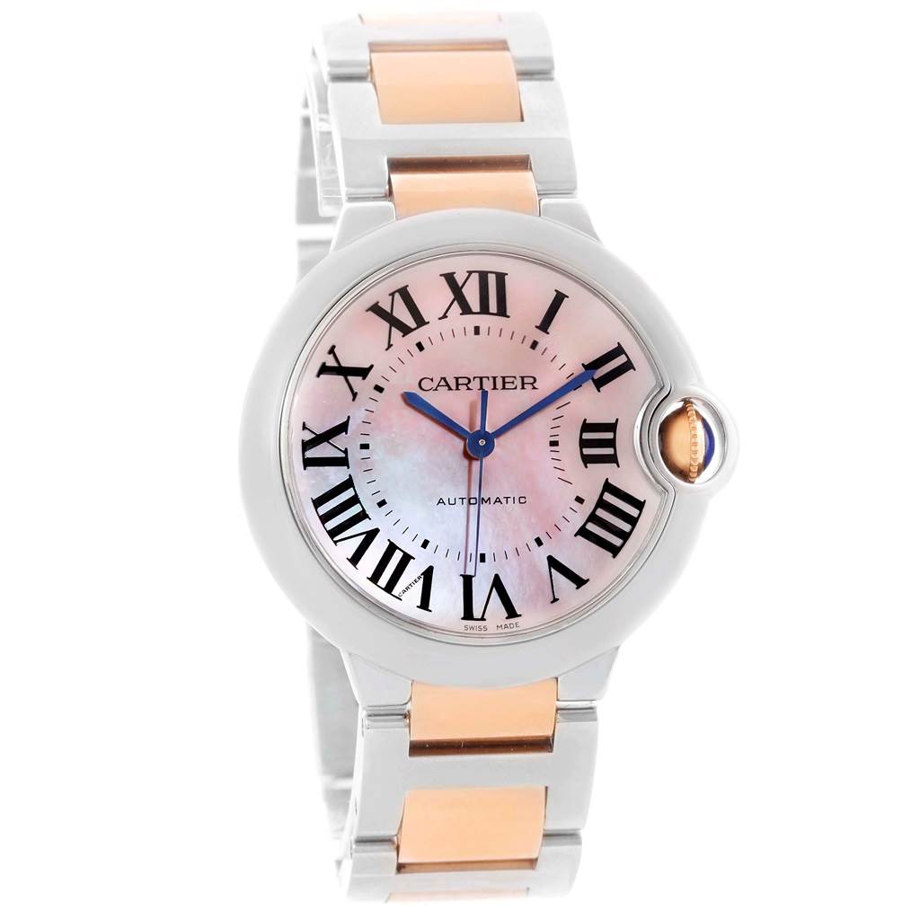 The image shows a frontal view of a Cartier Ballon Bleu W6920098 Women's Steel and Gold (two tone) Mother of Pearl Dial W6920098 Women's Steel and Gold (two tone) Mother of Pearl Dial watch, highlighting its face and bracelet.