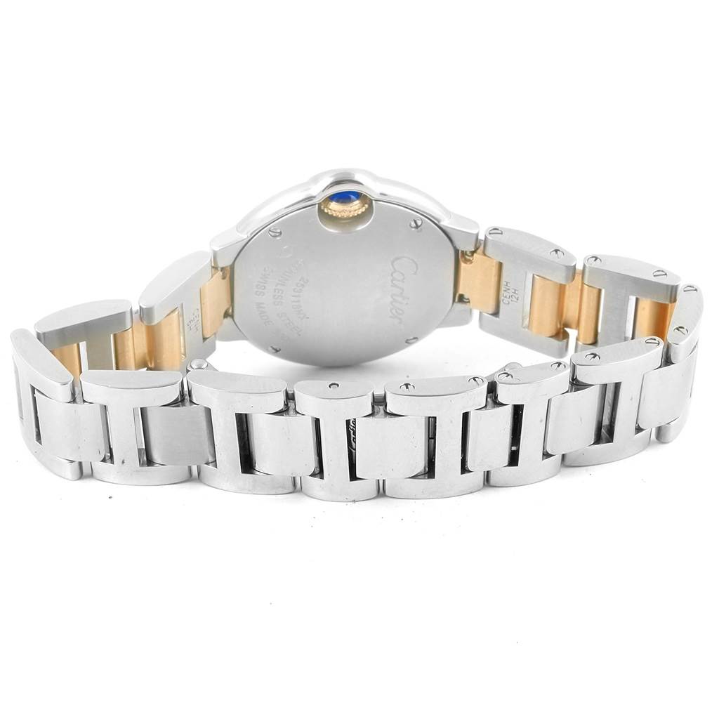 The image shows the back and bracelet of a Cartier Ballon Bleu W69007Z3 Women's Stainless Steel Silver Dial W69007Z3 Women's Stainless Steel Silver Dial watch, highlighting its stainless steel and gold links.