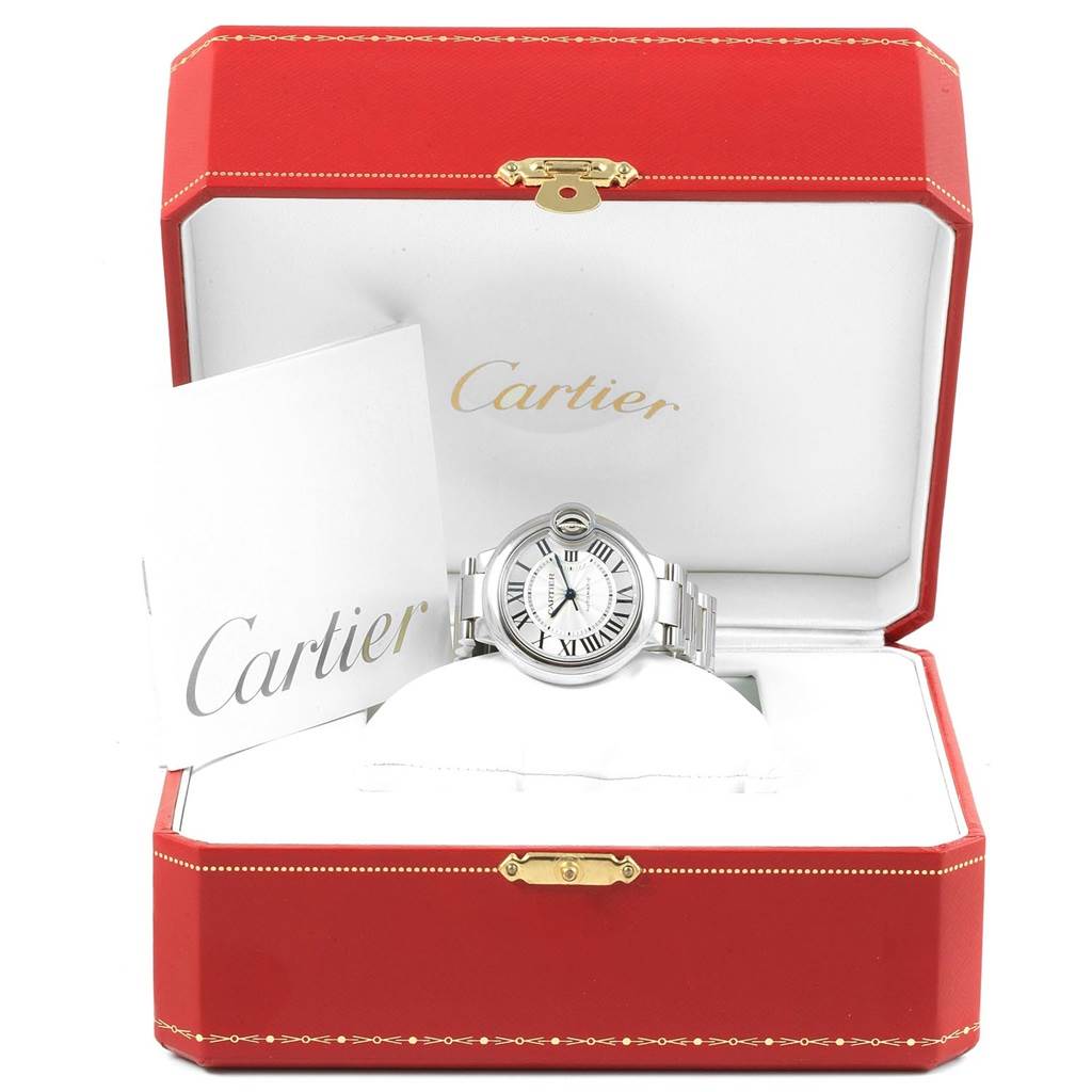 The Cartier Ballon Bleu W6920071 Women
s Stainless Steel Silver Dial W6920071 Women
s Stainless Steel Silver Dial watch is shown front-facing in its red box, with accompanying booklets.