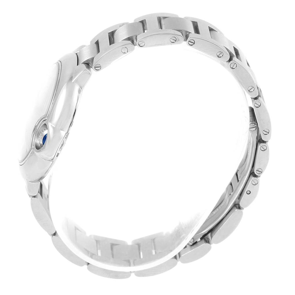 The image shows a side view of the Ballon Bleu by Cartier, highlighting its bracelet and case.