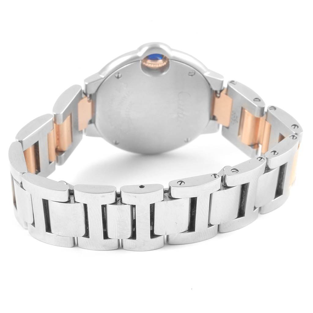 This image shows the back case and bracelet of the Cartier Ballon Bleu W6920034 Women's Steel and Gold (two tone) Mother of Pearl Dial W6920034 Women's Steel and Gold (two tone) Mother of Pearl Dial watch at an angled rear view.