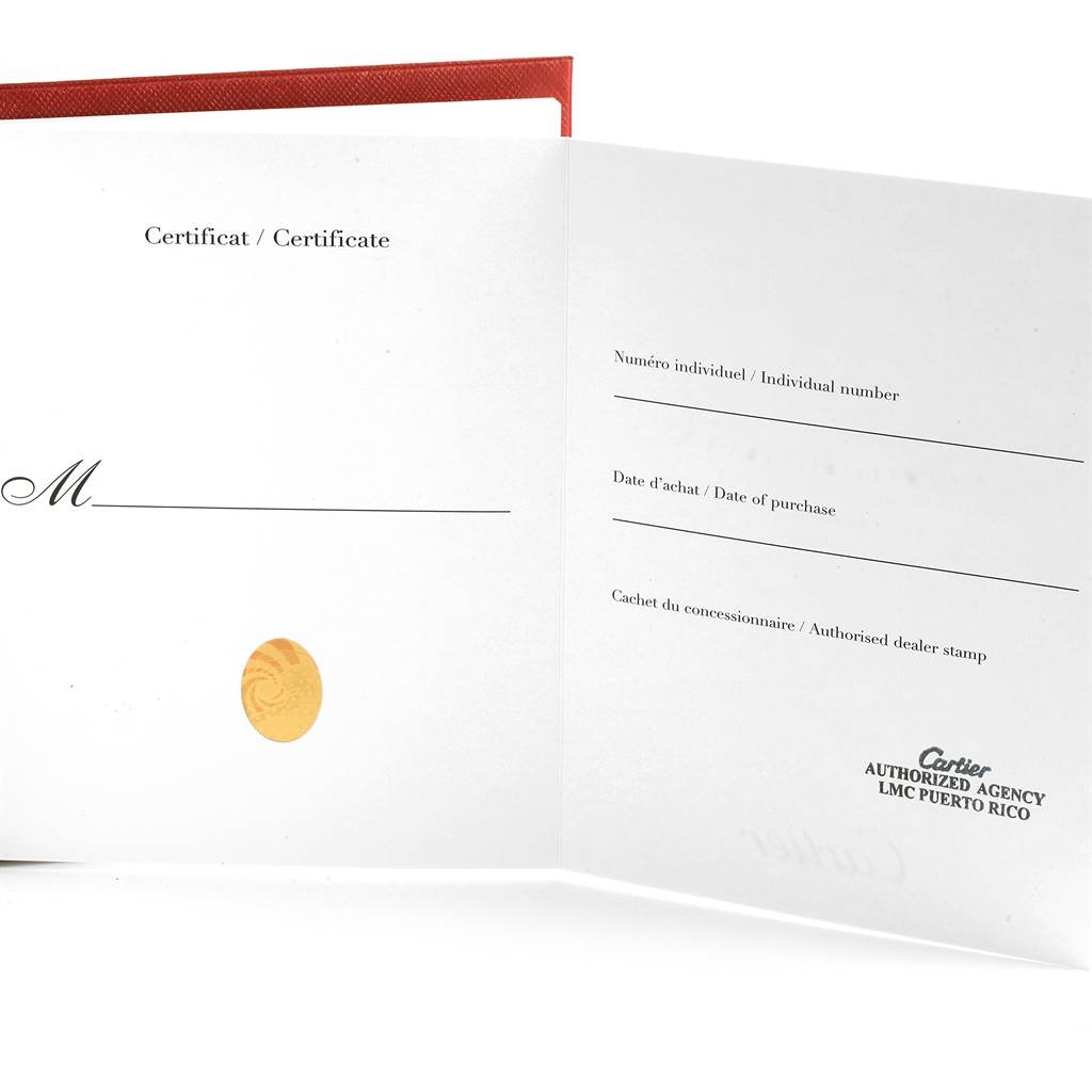 This image shows the warranty certificate booklet for the Cartier Ballon Bleu W6920034 Women's Steel and Gold (two tone) Mother of Pearl Dial W6920034 Women's Steel and Gold (two tone) Mother of Pearl Dial watch, including fields for the individual number, purchase date, and dealer stamp.