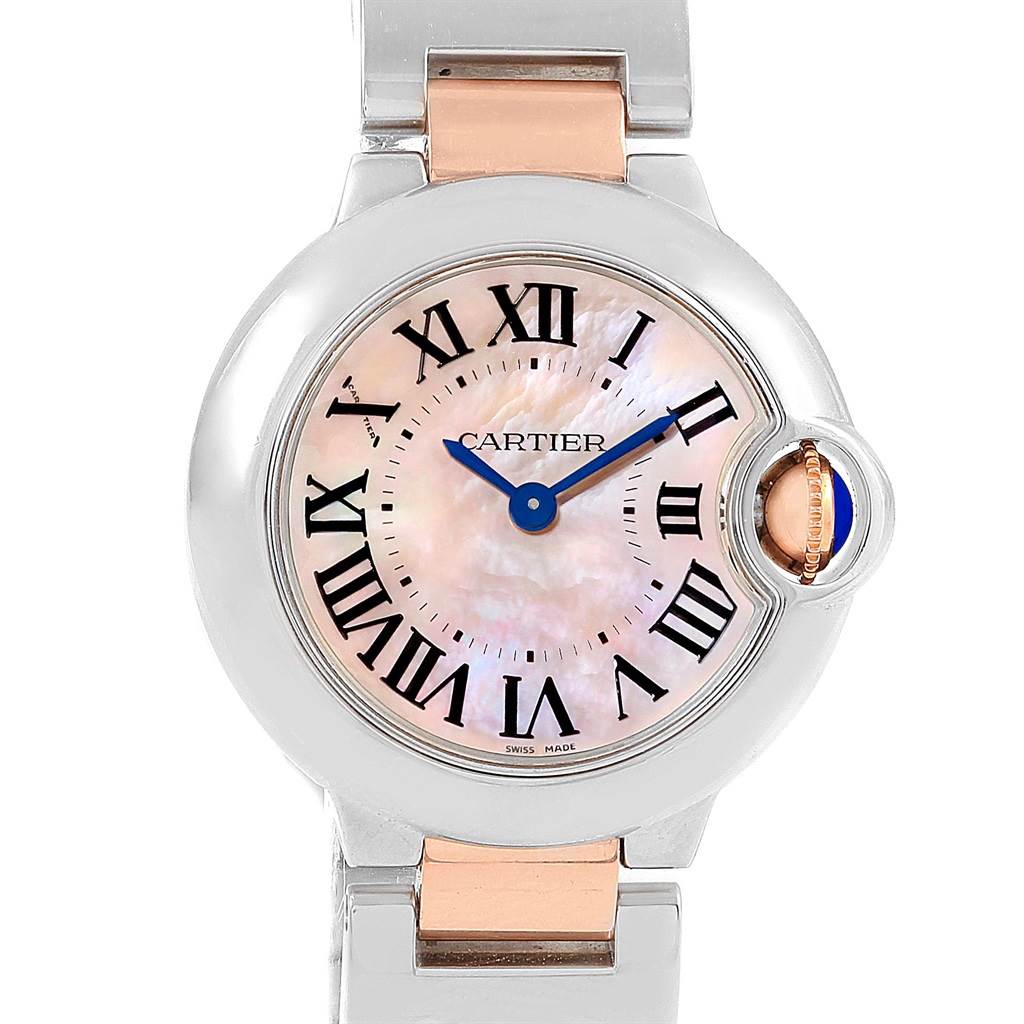 The image shows a close-up, front view of the dial and part of the bracelet of a Cartier Ballon Bleu W6920034 Women's Steel and Gold (two tone) Mother of Pearl Dial W6920034 Women's Steel and Gold (two tone) Mother of Pearl Dial watch.