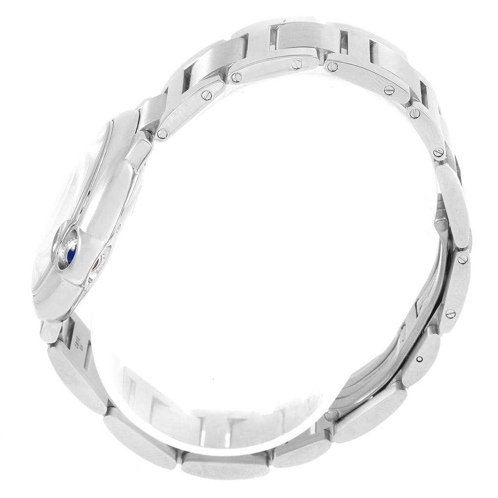 This side-angle view of the Ballon Bleu by Cartier highlights the watch
s case and bracelet.